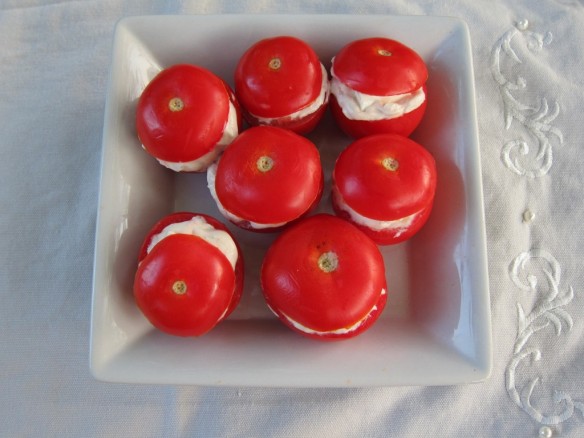 Cocktail Tomatoes stuffed with two Cheeses